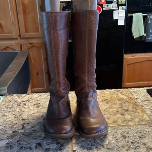 Brown knee high Doc Martens